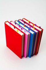 Stack of color books with book marks 