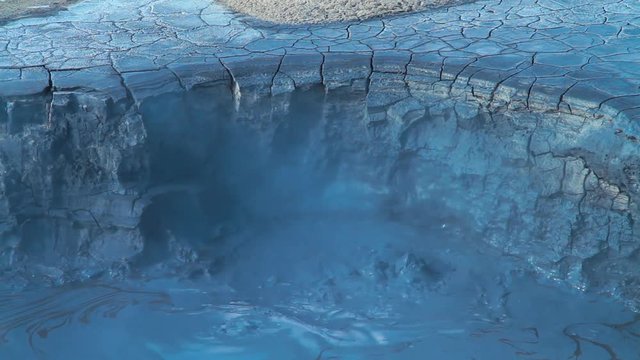 Hverir Namafjall geothermal site in Iceland. Fumarole volcanic boiling mud pots, surrounded by sulfur hot springs. Amazing place to travel!