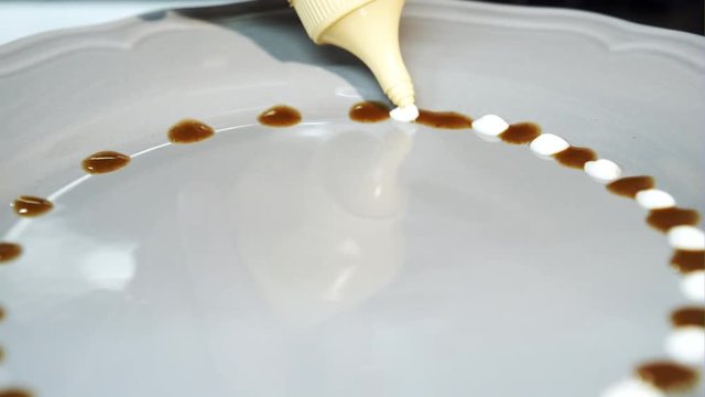 Chef decorating the dish