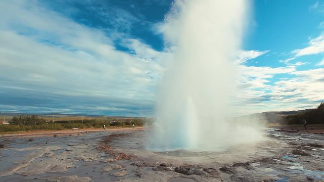 Strokkur geyser - Geisir is highly active and one of the most popular geysers in Iceland and a favourite stop to tourists in the famous Golden Circle.