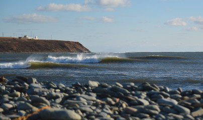 waves breaking on a sunny day