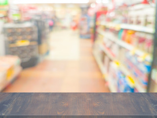 Empty wood table top on blurred in Supermarket Product Display