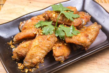 Fried chicken wings on plate
