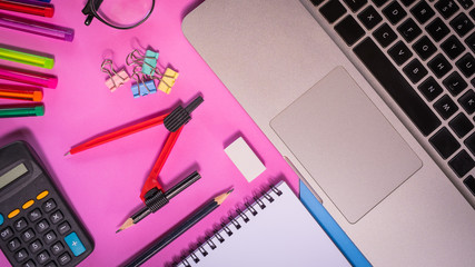 Flat lay, top view office table desk. feminine desk workspace with succulent, laptop, glasses, diary 