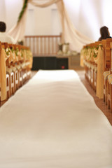 Fototapeta na wymiar Blurred seats for guests on wedding ceremony