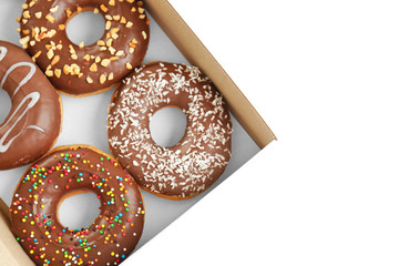 Tasty donuts in paper box on white background