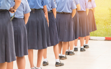 Fototapeta na wymiar Thailand secondary education girl students are standing in line