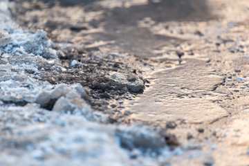 frozen puddle in the morning as a background