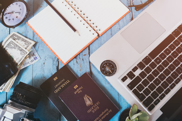 Overhead view of Traveler's accessories, Essential vacation items, Travel concept background, vintage background, love story, selective focus, go to see the world, save money for travel