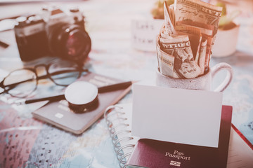 Overhead view of Traveler's accessories, Essential vacation items, Travel concept background, vintage background, love story, selective focus, save money to see the world