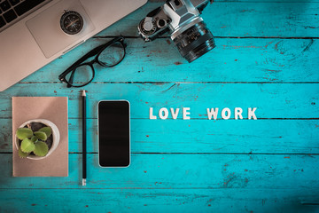 Looking for direction and inspiration, Business working at an office, Office desk table with computer, supplies, flower. Top view. Copy space for text, vintage