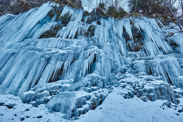 Frozen waterfall in the mountains