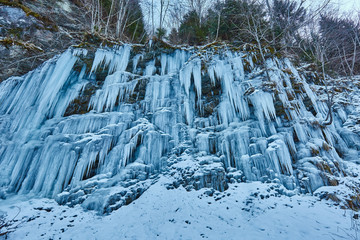 Frozen waterfall in the mountains