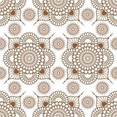 Background with brown and white mehndi henna seamless floral lace buta decoration items in Indian style.