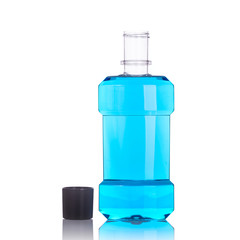 Bottle of blue mouthwashes. Studio shot isolated on white