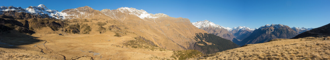 Great landscape on the Orobie Alps in winter season close to Cardeto natural lakes. View of the highest mountains including Pizzo Coca. Seriana Valley, Bergamo, Italy. 