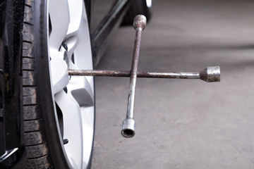 Changing the tire.