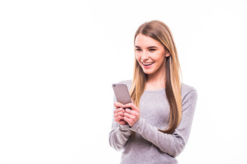 Naklejka premium Blonde woman texting on phone