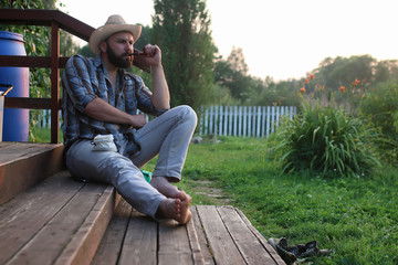 Fototapeta premium man smoke pipe outdoor