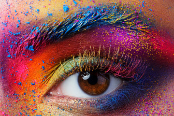 Close up view of female eye with bright multicolored fashion mak - obrazy, fototapety, plakaty