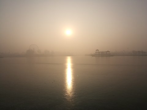 sunset and lake in frost