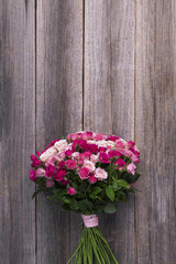 Roses on a wooden boards.