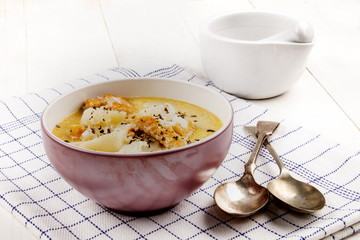 fish soup with smoked haddock, potato and crushed peppercorn
