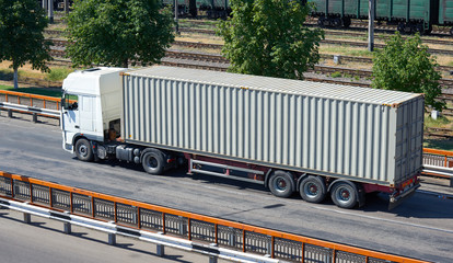 truck on road, industrial infrastructure and railroad, cargo transportation, delivery and shipping...