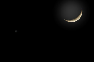 Obraz na płótnie Canvas crescent moon and venus background