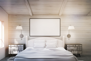 Double bed in a wooden room with poster, toned