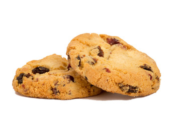 Two cookies with raisins isolated over white background
