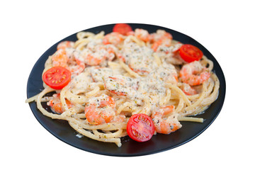  pasta with prawns on black plate