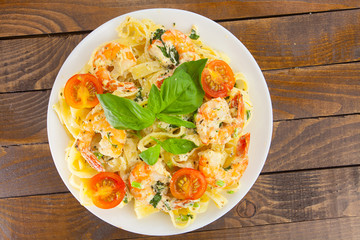  pasta with prawns on white plate