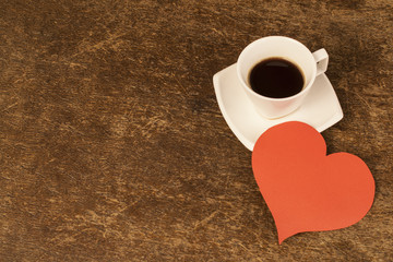 Obraz na płótnie Canvas Valentine's Day morning. Hot espresso and a big red heart.