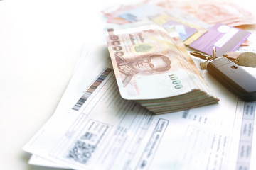Utility bills , Thailand banknotes and credit cards for payment