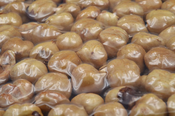 A vacuum packing of hazelnuts. Macro.