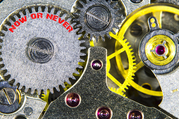 clockwork old mechanical  high resolution with words now or neve