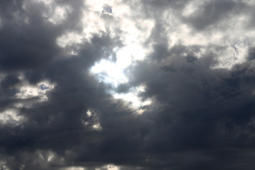 Very nice sunset , cloudy sky, sun ray in the sea of clouds