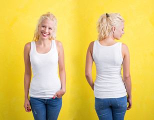 Woman in white tanktop on yellow background