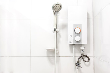 water heater and shower in bathroom