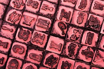 Close up of type set rubber stamps