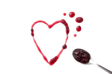 Berry jam heart and spoon isolated on white