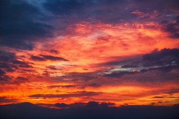 Fototapeta na wymiar Sunset dramatic sky clouds