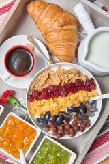 French breakfast on a wooden tray