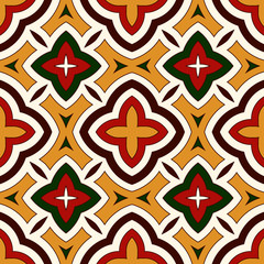 Bright seamless pattern with geometric ornament in Christmas traditional colors. Ethnic and tribal motifs.