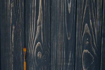 Fototapeta premium Art and craft tools. Artist's brush on dark rustic background. Space for text