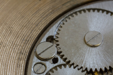 Fototapeta na wymiar Macro cog clockwork mechanism close up micro workings of watch with metallic wheel time precise motion & rotation