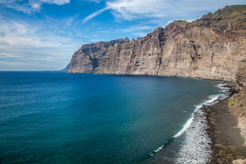 Fototapeta na wymiar Beach and cliffs at the Los Gigantes, Tenerife, Canary Islands, Spain