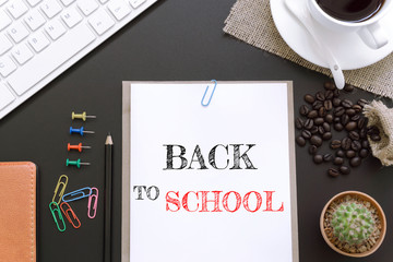 Text Back to School on white paper background / business concept