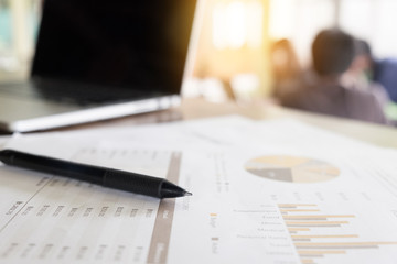 Close-up of business document in touchpad lying on the desk, off